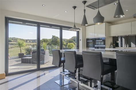 The folding doors are becoming more and more. The large glazed panels on the bi-folding door allow the ...