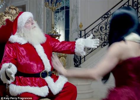 Katy Perry Sits On Santas Lap In Christmas Advert For
