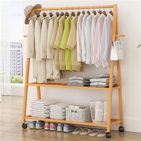 Wood Clothes Rack On Wheels Rolling Garment Rack With Tier Storage My