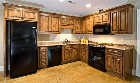 Dark stained knotty alder cabinets. Knotty Alder Kitchen Cabinet Doors | Hickory kitchen ...