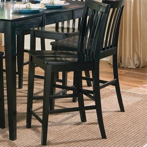 If you only need to raise the height 5 inches (13 cm) or lower, buy a dining chair cushion and tie it to your seat. Coaster Pines Counter Height Slat Back Dining Chair in Black - 101039BLKii