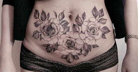 Stomach tattoos, as the name suggests, are tattoos that are done on the stomach, and due to the large canvas available on the stomach area, this has become a favorite and popular place to get a tattoo red tattoo pattern on stomach for women. Scar cover stomach tattoo of a rose bouquet.