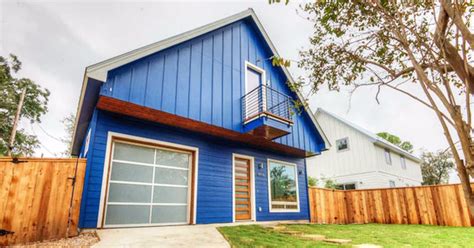 Check Out A Bright Blue Cottage Thats Bold On The Outside And Sleek On