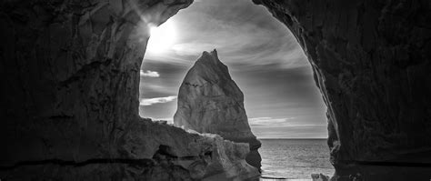 Download Wallpaper 2560x1080 Cave Arch Rock Sea Landscape Black