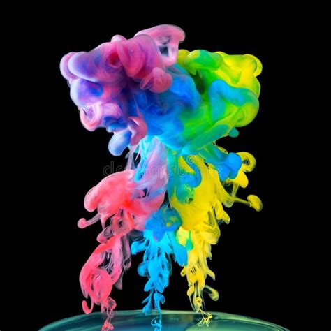 Colored Inks In Water On Black Background Stock Photo Image Of