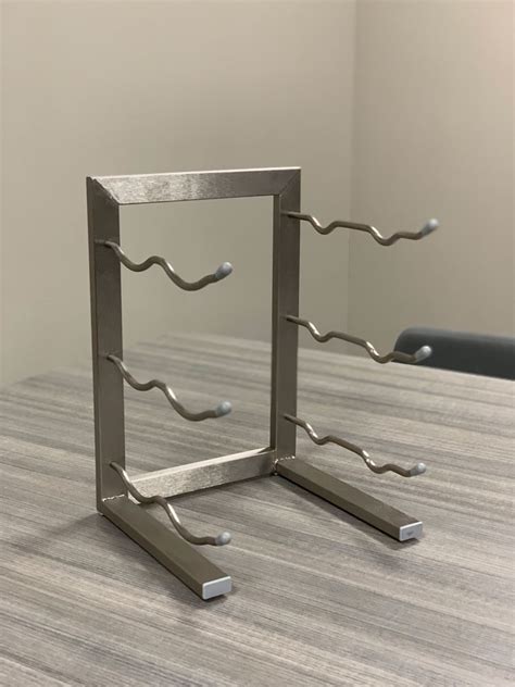 Maybe you would like to learn more about one of these? Mini 6-Bottle Tabletop Metal Wine Rack - VintageView