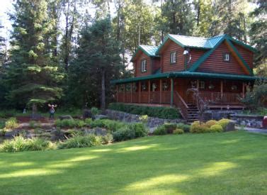 The seward cottage comes with a living area, a satellite tv and a flat screen tv. Alaska Cabin Rentals | Seward, Alaska - Box Canyon Cabins