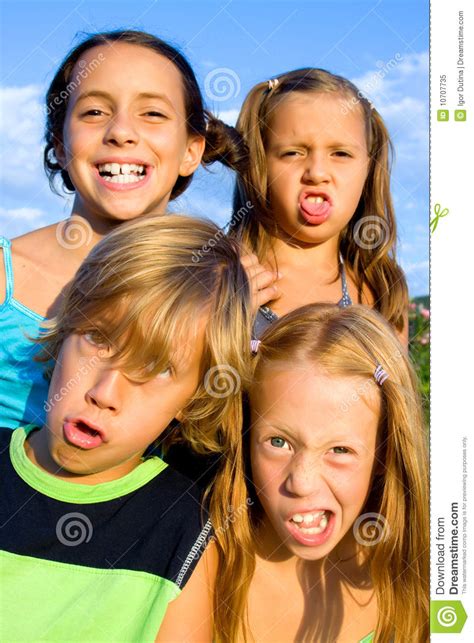 Four Young Kids Making Funny Faces Stock Image Image Of Girl