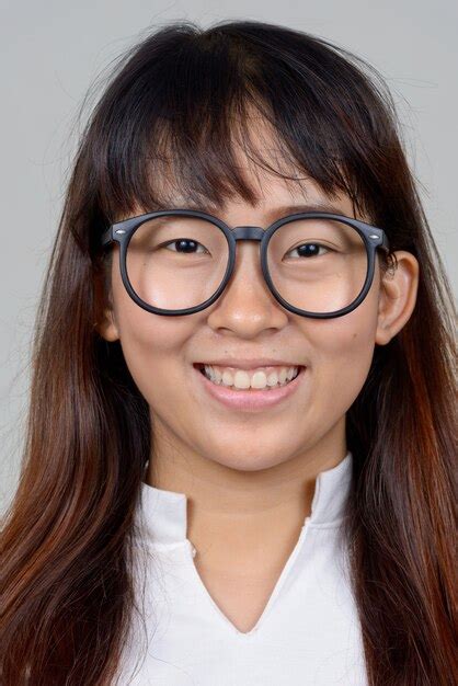 Premium Photo Face Of Happy Young Asian Nerd Woman With Eyeglasses