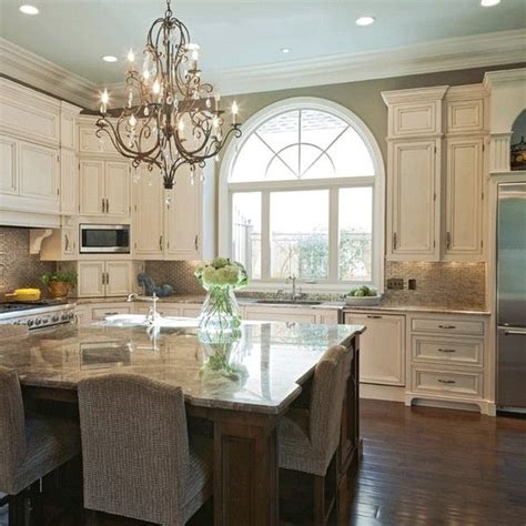 The two colors work well together because red lends zing to cream surfaces, while ivory hues give a mellow warmth to bright red. 80+ BEST Simple And Elegant Cream Colored Kitchen Cabinets Design Ideas | Cream colored ...