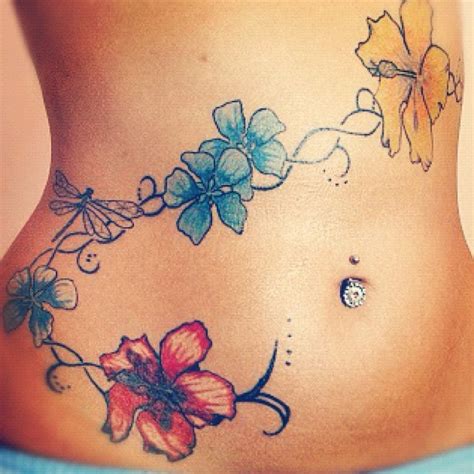 Rose tattoos on lower stomach. Flower Tattoo