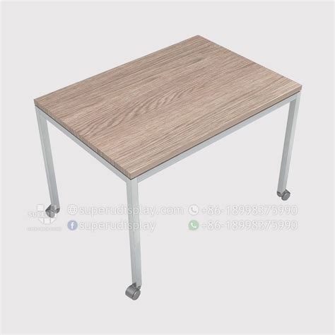 With a steel welding or fab table, consider the coating and slots on the surface. Custom Metal and Wood Mobile Bag Shop Display Table with ...