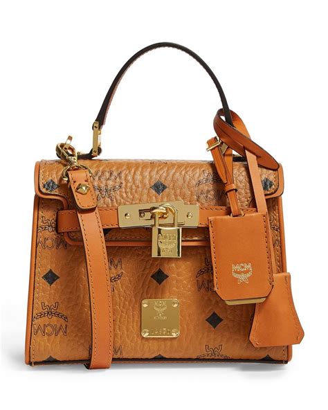 Lyst Mcm Mini Heritage Satchel Bag In Brown