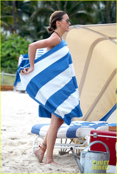 Katie Cassidy Rocks Leopard And Gold Bikinis At Miami Beach Photo