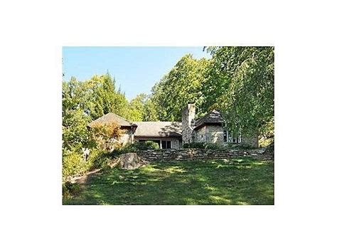 Nestled On 12 Acres Of Wooded Land This Unique Stone Cottage Is