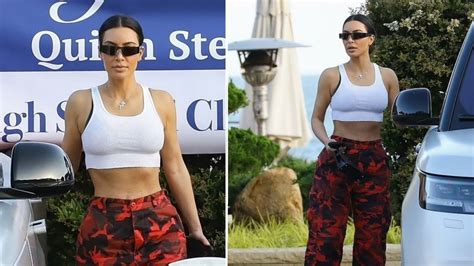 Kim Kardashian Flaunts Very Tiny Waist In A Sports Bra And Red Camo