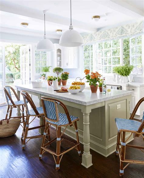 It does appear luxurious, but that is the result of white cabinets combined with proper lighting. 18 Amazing Kitchen Island Ideas, Plus Costs & ROI - Home Remodeling Costs Guide