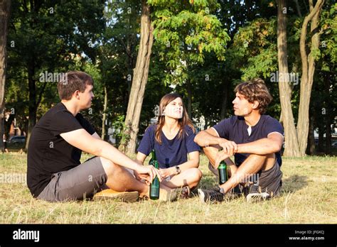 Friends Talk In The Park Stock Photo Alamy