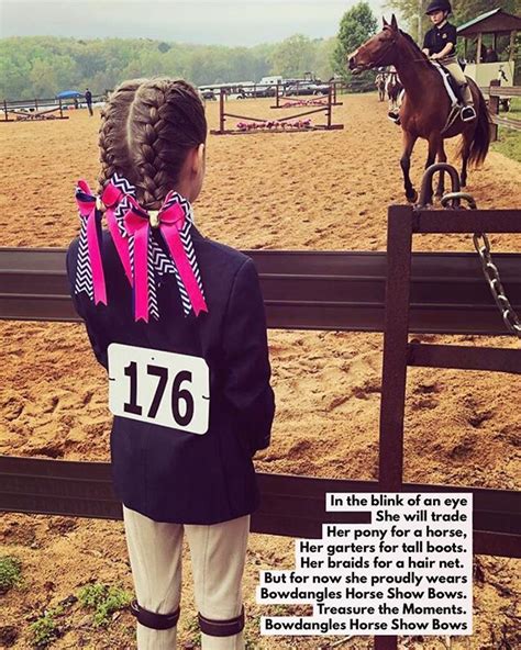 At A Horse Show A Young Girl Wearing Equestrian Bows Is Inspired As