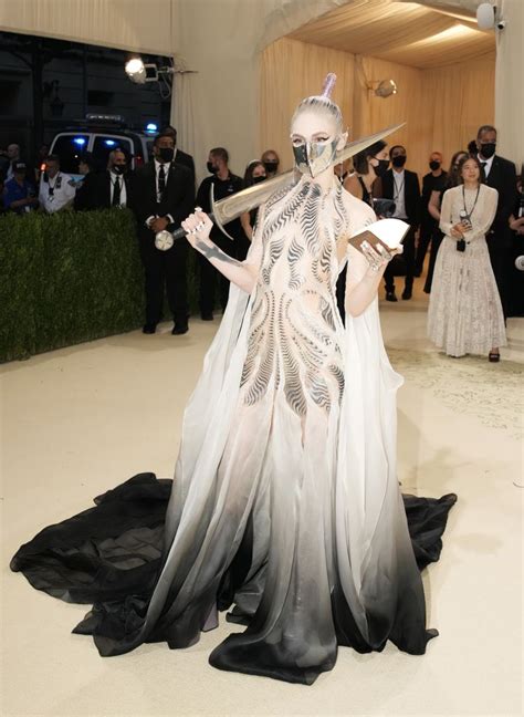 Grimes Brought A Sword To The Met Gala And Its Made From Something