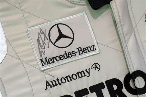 Sold Framed Replica Racing Suit Michael Schumacher S Signed Mercedes AMG Petronas Racing Suit
