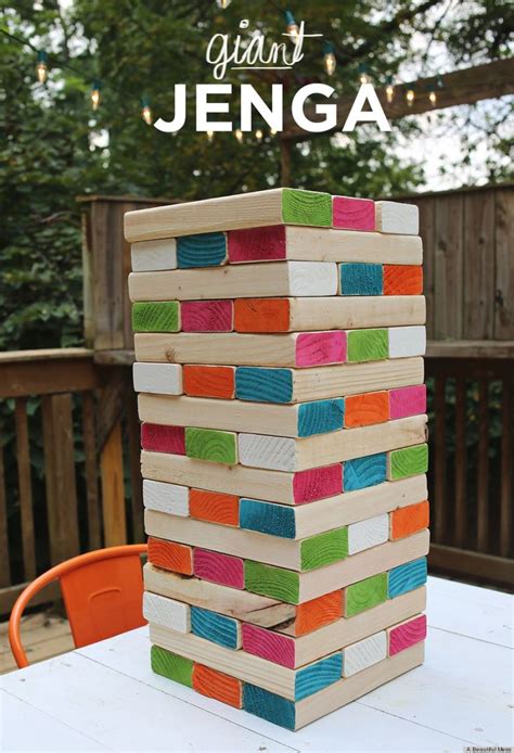 Painting the ends of each block with paint that can withstand outside elements is the icing on the cake! DIY Giant Jenga Is The Coolest Backyard Game Ever (PHOTO) | HuffPost