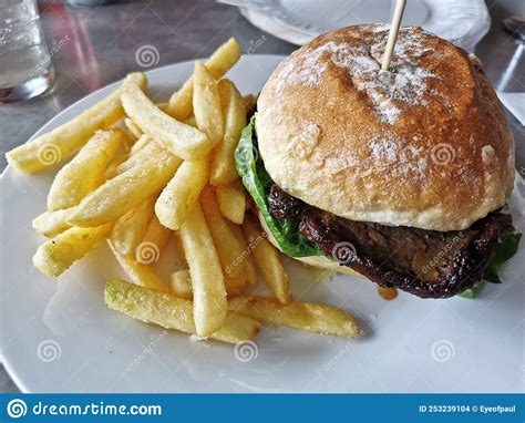 Chargrilled Thin Beef Steak Burger With Golden Beer Battered French