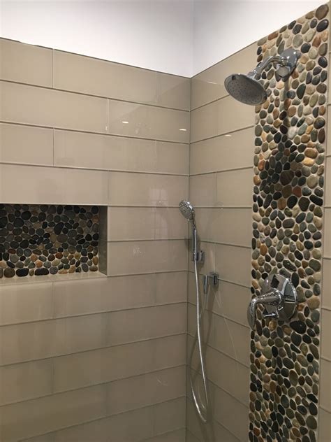 Stunning Accent Strip And Niche Using Glazed Bali Ocean Pebble Tile