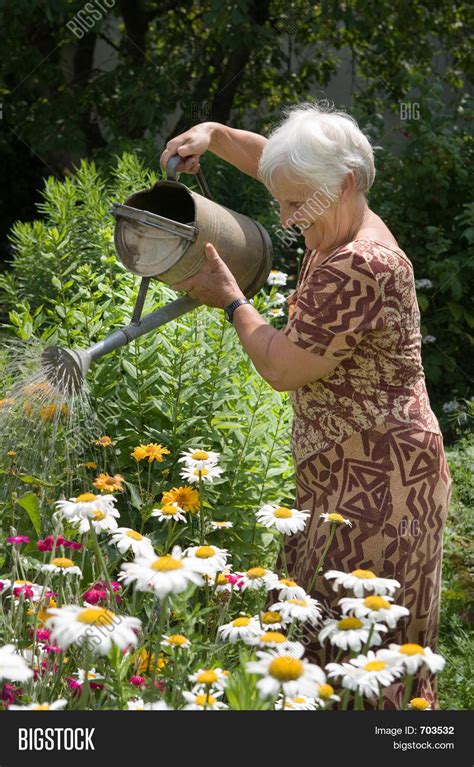 Watering Flowers Image And Photo Free Trial Bigstock