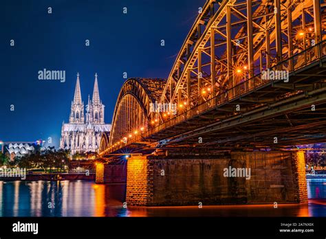 Panorama Of The City Of Cologne At Night With Cologne Cathedral