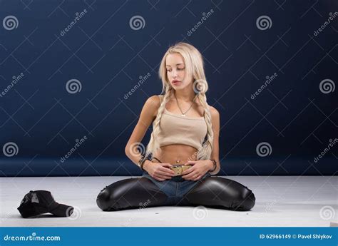 Attractive Blond Woman Sitting On Her Knees Stock Image Image Of