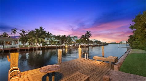 Enjoy entertaining, swimming in the pool or relaxing… Presenting: 4 Harvard Drive, Lake Worth Lagoon Waterfront ...
