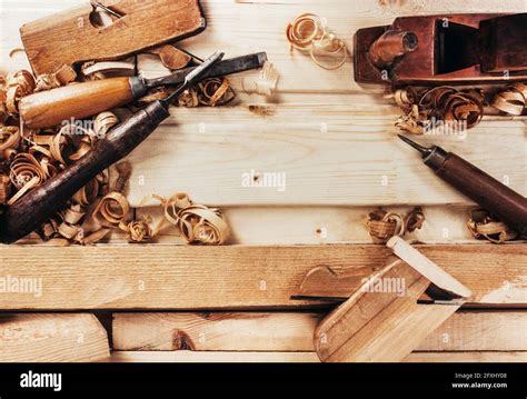 Photo Of Wooden Old Fashioned Planes With Carving Chisels Laying On