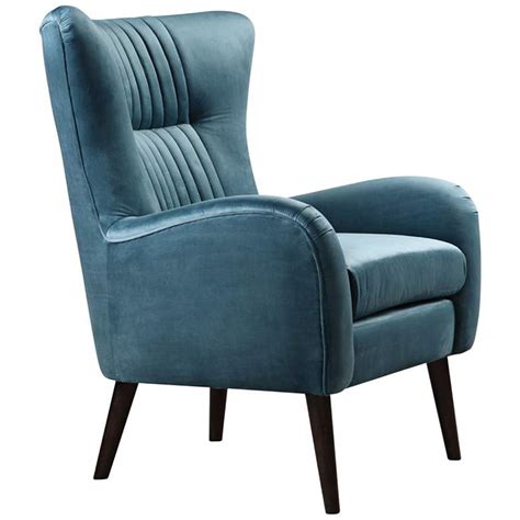 Draw attention to an otherwise empty corner of the room by adding this pisano teal blue accent chair with pillow. Uttermost Dax Teal Blue Velvet Tufted Accent Chair ...