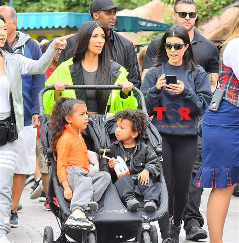 Why does kim kardashian have an edited waist? Cute photos of Kim Kardashian and her kids at Disney