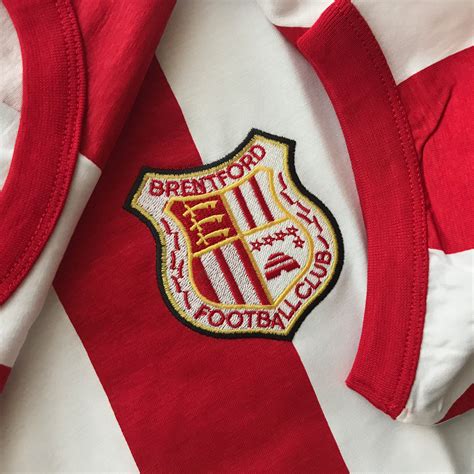 Now we're not saying brentford's new badge was commissioned by a giant insect holding its stinger over the throat of an intrepid designer, but it would be irresponsible to rule it out. Retro Brentford Football Shirt with Embroidered Badge ...