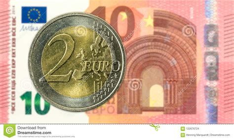 2 Euro Coins Against 10 Euro Bank Note Obverse Stock Photo Image Of