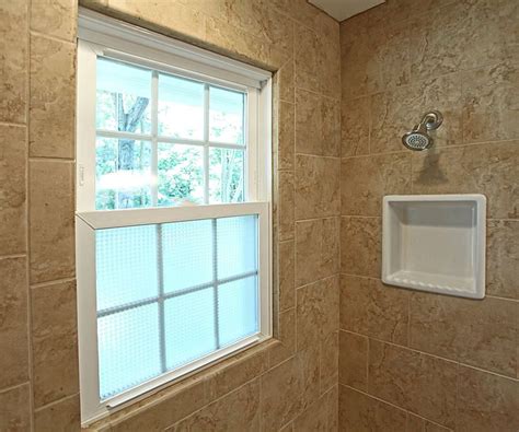 What's involved with tiling a bathroom? Like the tile around the window and the frosted glass. Waterproof and still letting the light in ...