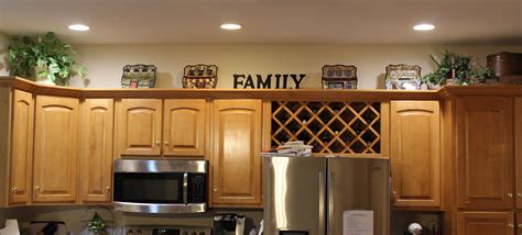 There's even an example from martha stewart herself! Decorating above the kitchen cabinets. I put suitcases in ...