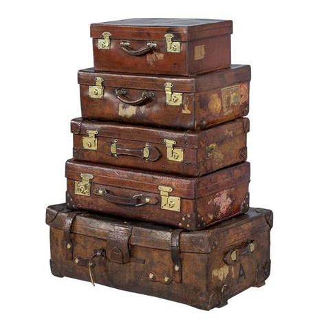 The antique cherry wooden suitcase is decorated with leather cord in an x shape. Set of Five Antique Leather Luggage Cabin Trunks For Sale ...