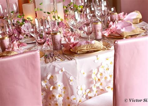 A voluminous pink chiffon table scarf is gathered across the table, pooling in areas to again add layer and interest. Pink and Gold wedding table setting | Pink Weddings ...