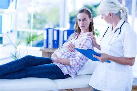 Female Doctor Talking To A Pregnant Woman Stock Image Image Of People