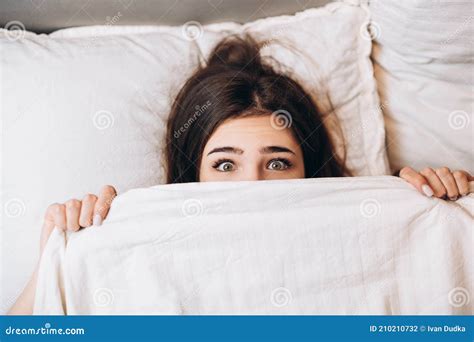 Model Woman Hiding Under The Blanket Young Woman Is Very Scared Stock