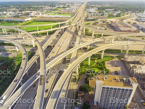 Top View Stack Interchange Expressway And Houston Skyline Background