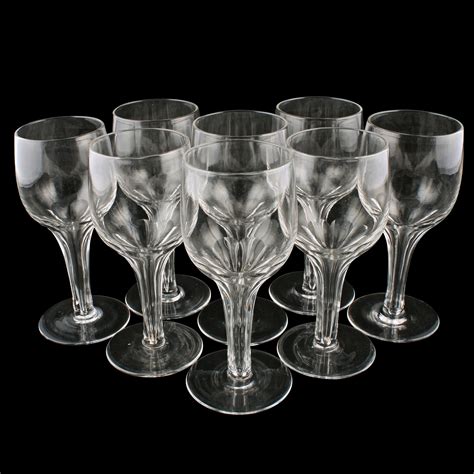 A Set Of Eight Late 19th To Early 20th Century Wine Glasses With Hollow Stems The Glasses Have