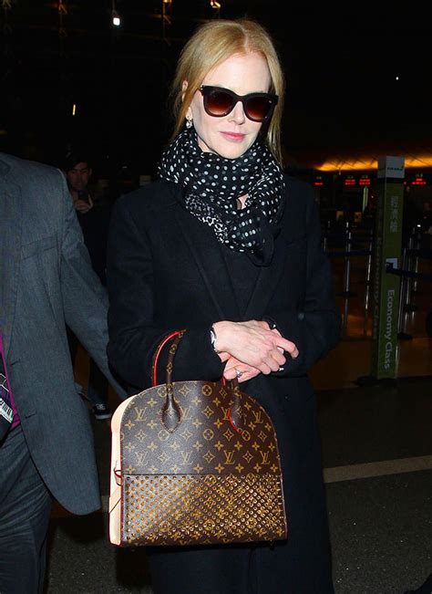 celebrities wearing louis vuitton bags