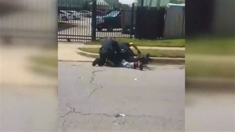 Video Shows Police Repeatedly Punching Man Pinned To Street As He Cries Why