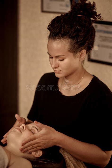 Healing Facial Massage In A Beauty Salon Wellness Facial Massage