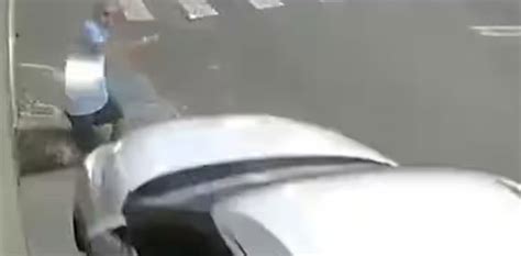 Watch Speeding Car Almost Crushes Elderly Man