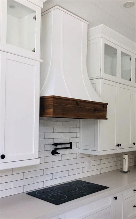 This elegant model will make a bold statement within the overall kitchen design. Epicurean / Artisan Style Hood with Strapping & a Rustic ...